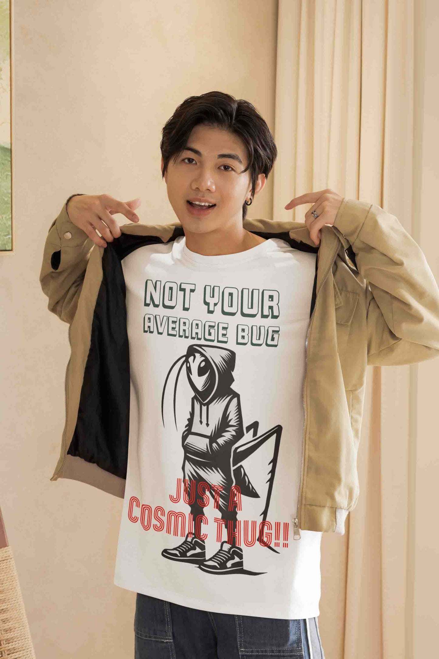 Oversized t-shirt with cartoon alien bug design reading "Not Your Average Bug – Just a Cosmic Thug"